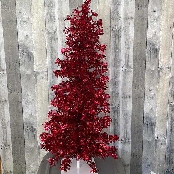 Other - Red tinsel Christmas tree on a white metal base.  Approx 4’ tall. Light weight.